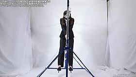 A woman engages in self-pleasure with a rope.