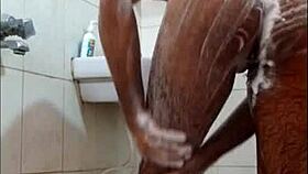 dude gets off in the shower while bathing alone.