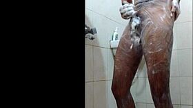 dude gets off in the shower while bathing alone.