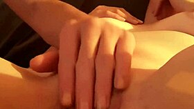 I'm playing with her shaved pussy, fingering close up in our amateur session