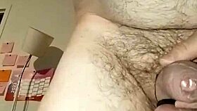 Detailed handjob session with massive cock and foreskin retraction