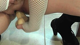 Lesbian feels intense pleasure from cumshot on big tits