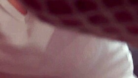 Lesbian feels intense pleasure from cumshot on big tits