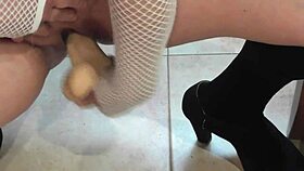 Lesbian feels intense pleasure from cumshot on big tits