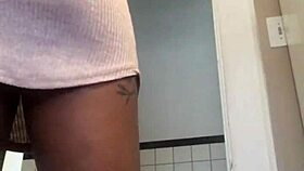 upskirt peek at her pussy, wow! that ebony thong drives me crazy under her dress.