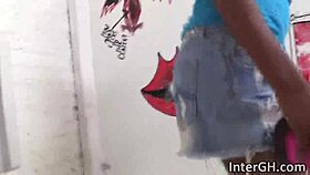 Big ass ebony slut offers a fantastic blowbang on a big cock through a glory hole