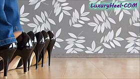 High patent black stiletto heels dominate in wild footjob fetish scene. Highest style for intense action.