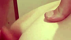 the mature woman is playing with toys and getting spanked