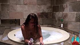 Does my whore show off in red bathtub?