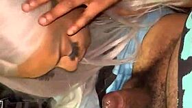 Ebony Queen gets sloppy blowjob while listening to some music