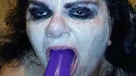 Ms. TL explores deepthroat with toys and dildo, gagging and choking intensely.