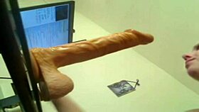 Can this blonde handle deep throating a huge dildo while teasing with toys and cum in a hardcore scene?