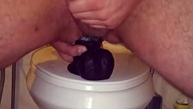 Having fun with two huge dildos in my ass.