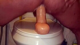 Having fun with two huge dildos in my ass.