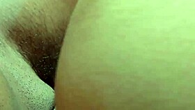 i'm a petite 18+ girl giving a blowjob to a black cock passionately.