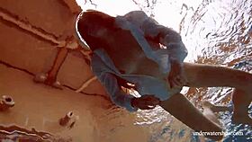 Big tits redhead Lola strips nude underwater in steamy display