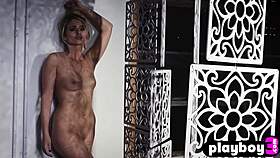 beautiful blonde model lindsay marie strips in black lingerie