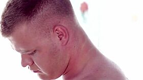 In this reality scene, a gay amateur bodybuilder gives a blowjob to a muscular European guy.