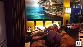 Peruanita EN Corset Rojo shares an intimate moment with her couple.