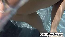 horny olivia asks, 'want to see me play with my pussy underwater?' she teases her big tits and ass.