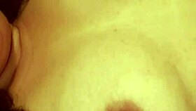 this hot girl moans loudly while masturbating her natural tits and cumming hard in this homemade video