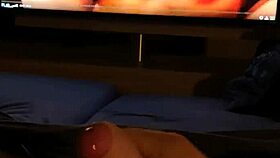 Tattooed redhead masturbates intensely while watching pornstar cumshot