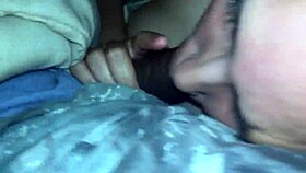 Woman sucks big black cock until cumshot in this scene
