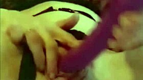 Milf masturbates her big clit with toy