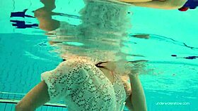 White dressed babe Katy Soroka dives underwater tight