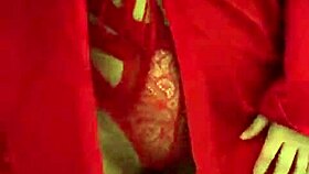 brunette in red lingerie plays with herself