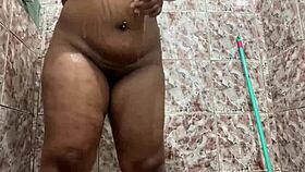 Beautiful woman without a top in the restroom