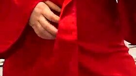 brunette in red lingerie plays with herself