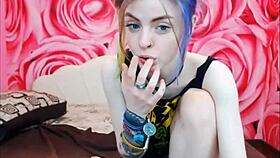 Cute tattooed teen on webcam