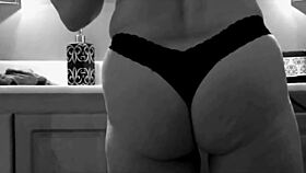 mature woman teases with her curvy ass and full tits