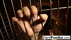 I enjoy dani daniels's bitch role in cage, showing off big tits and ass