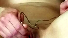 Bald pussy squirting cum during intense masturbation session