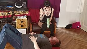 Slim goth domina feeds her slave mouth to mouth