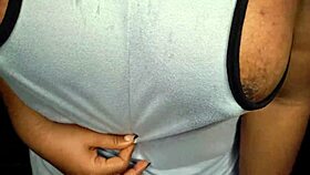 Ebony milf tempts with tits in face!