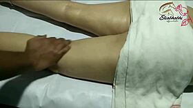 the amateur indian lady receives a full body massage close up at home with homemade techniques.