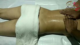 the amateur indian lady receives a full body massage close up at home with homemade techniques.