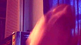 Allison moans stroking her big cock to cumshot.