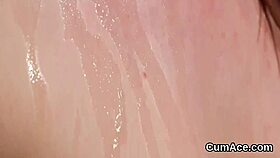 frisky babe receives cum load on her face while sucking all the spunk