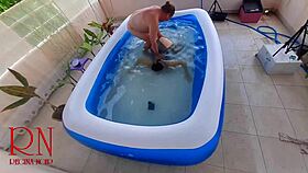 Erotic breast play and godess Regina Noir in the pool