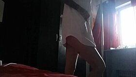 Hot blonde fingers her pussy in friend's house.