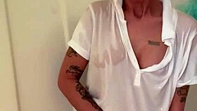 Milf fulfills fan request in the shower with dildo