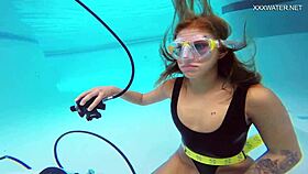 In this video, Russian teen Katya Nakolkina shows off her underwater adventure