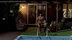 Majorette strips bikini by the pool!