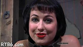 hotty strips seductively inside a locked cage