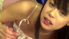 Cute japanese babe gives handjob to horny guy
