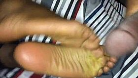 retro ebony footjob scene in classic blue film style